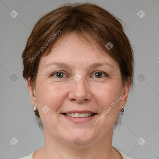 Joyful white adult female with medium  brown hair and grey eyes