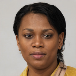 Neutral black young-adult female with short  black hair and brown eyes