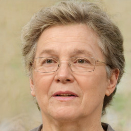 Joyful white middle-aged female with short  brown hair and brown eyes