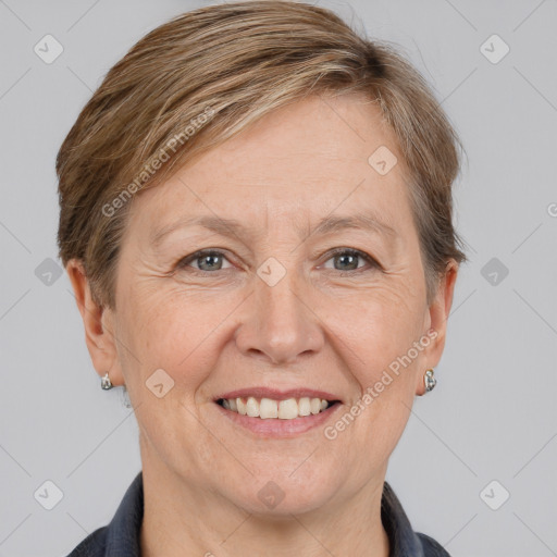 Joyful white adult female with short  brown hair and grey eyes