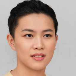 Joyful asian young-adult female with short  brown hair and brown eyes