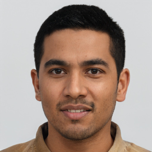 Joyful asian young-adult male with short  black hair and brown eyes