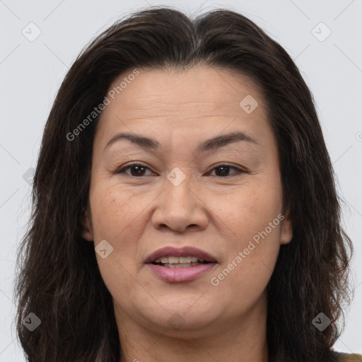 Joyful white adult female with medium  brown hair and brown eyes