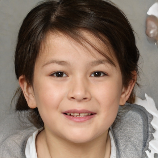 Joyful white child female with medium  brown hair and brown eyes