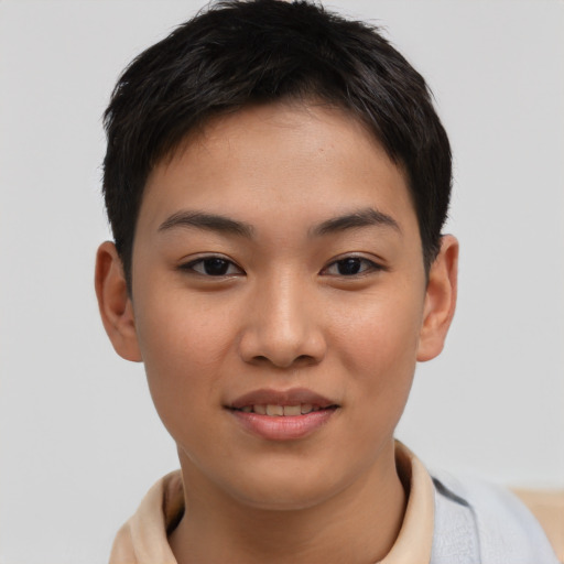 Joyful asian young-adult female with short  brown hair and brown eyes