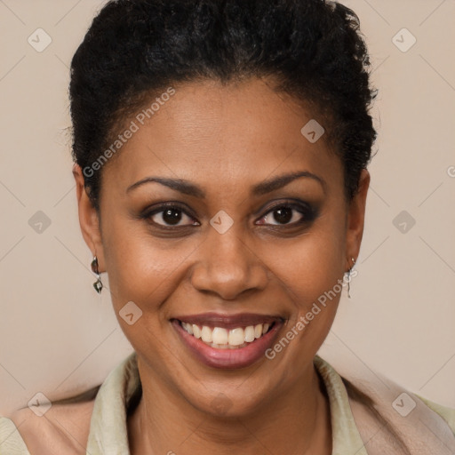 Joyful black young-adult female with short  brown hair and brown eyes