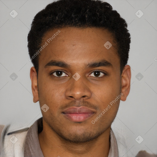 Joyful latino young-adult male with short  brown hair and brown eyes