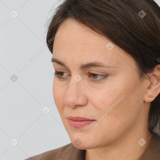 Neutral white young-adult female with medium  brown hair and brown eyes