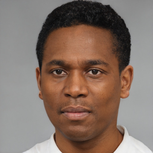 Neutral black young-adult male with short  black hair and brown eyes