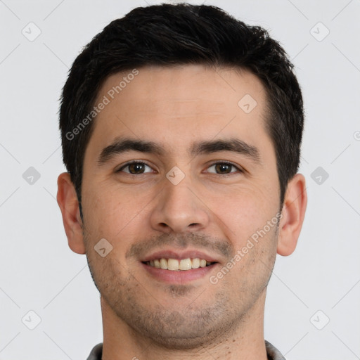 Joyful white young-adult male with short  black hair and brown eyes