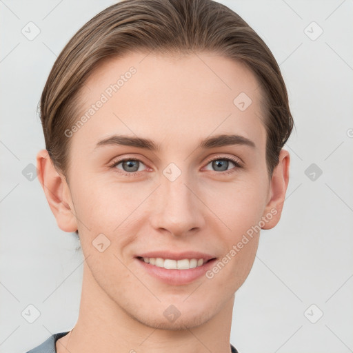 Joyful white young-adult female with short  brown hair and grey eyes