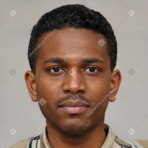 Neutral latino young-adult male with short  brown hair and brown eyes
