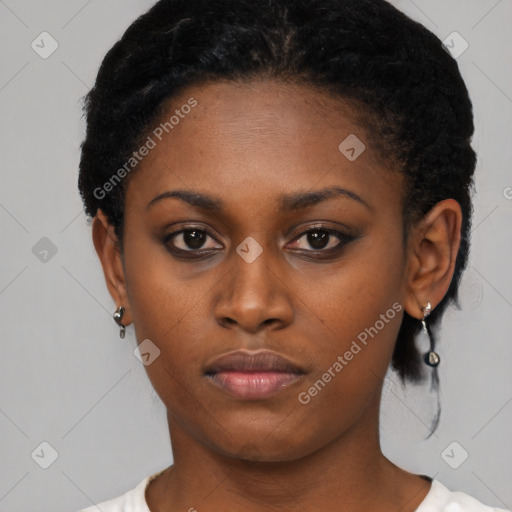 Neutral black young-adult female with short  black hair and brown eyes