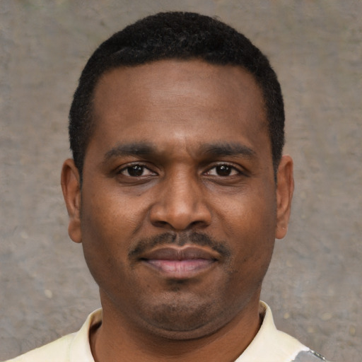 Neutral black young-adult male with short  brown hair and brown eyes