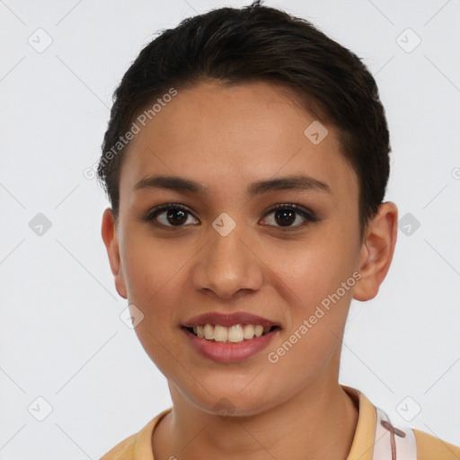 Joyful latino young-adult female with short  brown hair and brown eyes