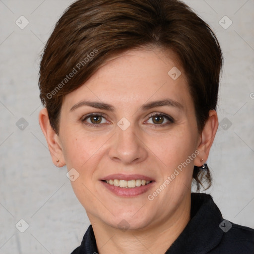 Joyful white young-adult female with short  brown hair and grey eyes