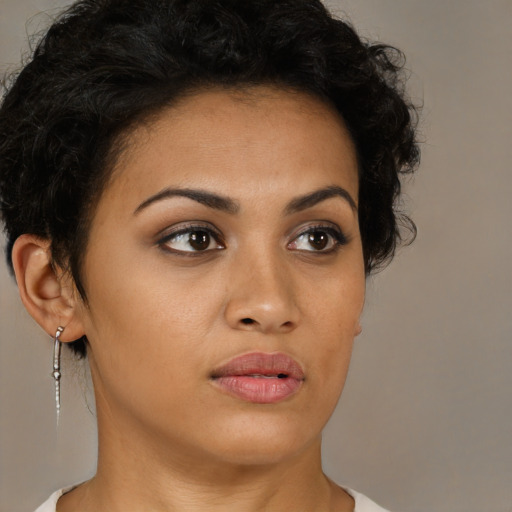 Neutral latino young-adult female with short  brown hair and brown eyes