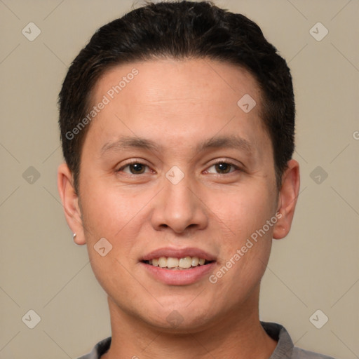 Joyful white adult male with short  brown hair and brown eyes