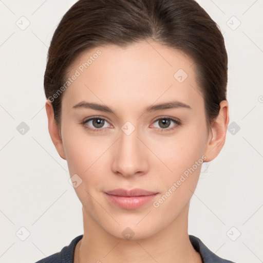 Neutral white young-adult female with short  brown hair and brown eyes