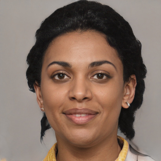 Joyful latino young-adult female with medium  black hair and brown eyes