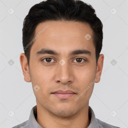 Neutral white young-adult male with short  brown hair and brown eyes