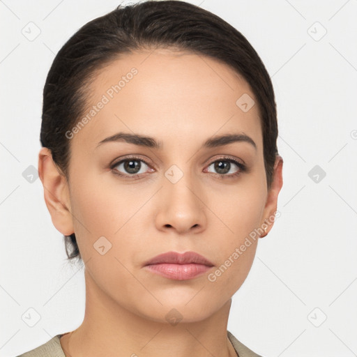 Neutral white young-adult female with medium  brown hair and brown eyes