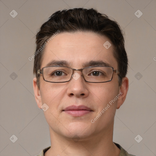 Joyful white young-adult male with short  brown hair and grey eyes