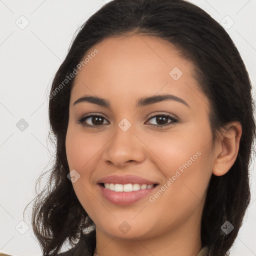 Joyful latino young-adult female with long  brown hair and brown eyes