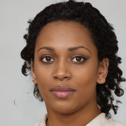 Neutral black young-adult female with long  black hair and brown eyes