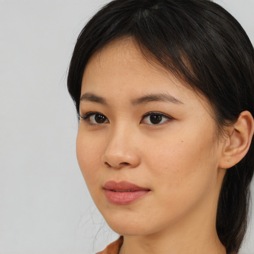 Neutral asian young-adult female with medium  brown hair and brown eyes