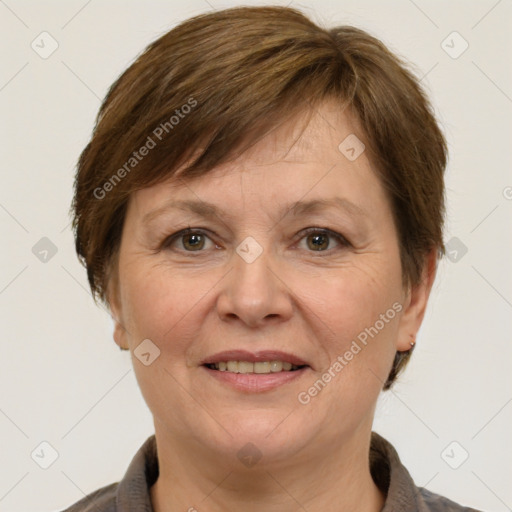 Joyful white adult female with medium  brown hair and grey eyes