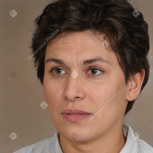 Joyful white adult female with short  brown hair and brown eyes