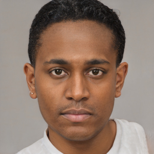 Neutral black young-adult male with short  black hair and brown eyes