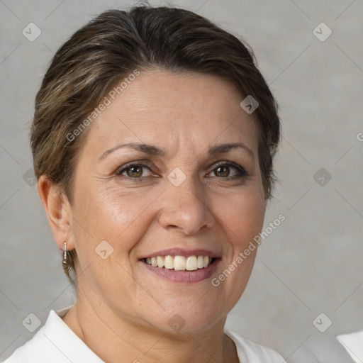 Joyful white adult female with short  brown hair and brown eyes