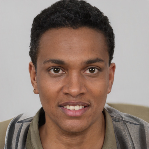 Joyful black young-adult male with short  black hair and brown eyes
