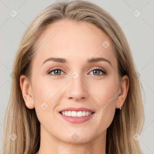 Joyful white young-adult female with long  brown hair and grey eyes