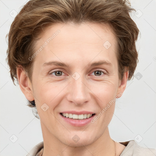 Joyful white adult female with short  brown hair and grey eyes