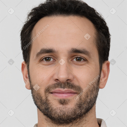 Joyful white young-adult male with short  brown hair and brown eyes