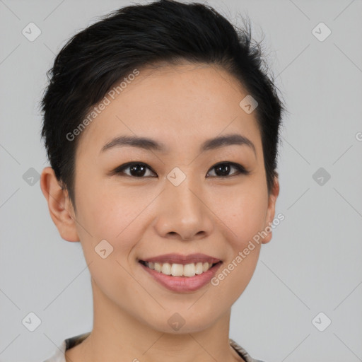 Joyful asian young-adult female with short  black hair and brown eyes