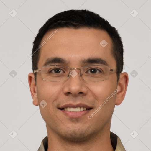 Joyful white young-adult male with short  black hair and brown eyes