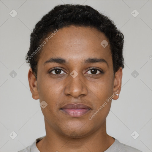 Joyful black young-adult male with short  brown hair and brown eyes