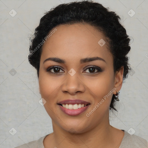 Joyful latino young-adult female with short  black hair and brown eyes