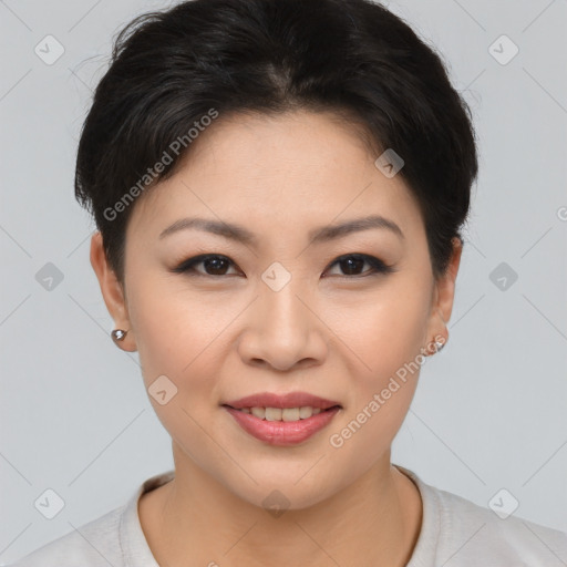 Joyful asian young-adult female with short  brown hair and brown eyes