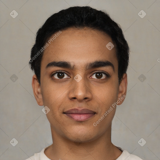 Joyful latino young-adult male with short  black hair and brown eyes