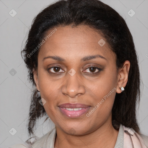 Joyful latino adult female with medium  brown hair and brown eyes