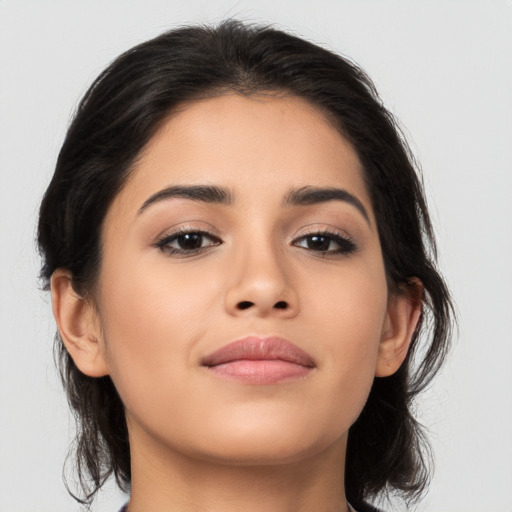 Joyful asian young-adult female with medium  brown hair and brown eyes