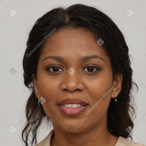 Joyful black young-adult female with medium  brown hair and brown eyes