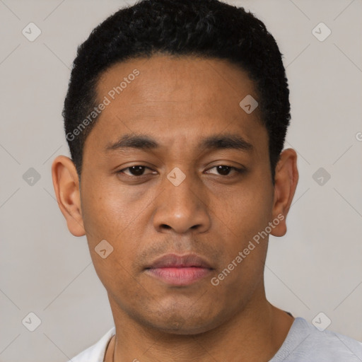 Neutral latino young-adult male with short  black hair and brown eyes