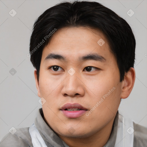 Neutral asian young-adult male with short  black hair and brown eyes