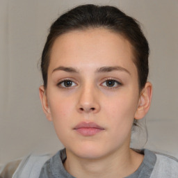 Neutral white young-adult female with short  brown hair and brown eyes